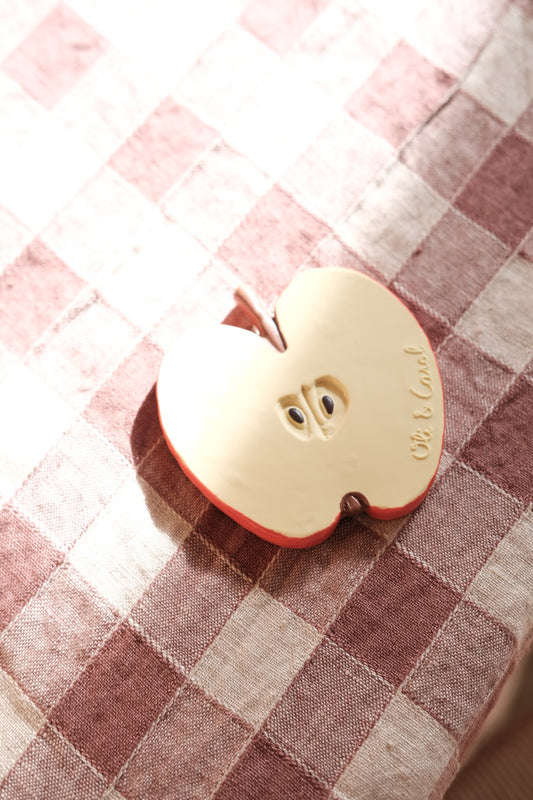 Biting • Apple